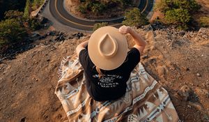 Preview wallpaper girl, hat, view, back, road, rocks
