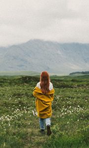 Preview wallpaper girl, lawn, mountains, fog, nature