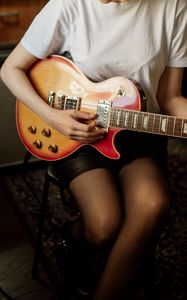 Preview wallpaper girl, legs, guitar, music