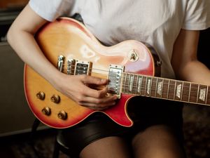 Preview wallpaper girl, legs, guitar, music