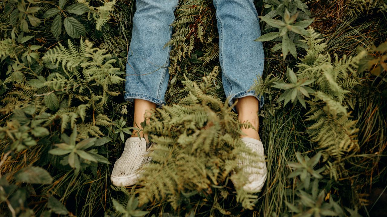 Wallpaper girl, legs, jeans, hands, grass