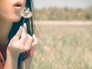 Preview wallpaper girl, lips, dandelion, breath, grass