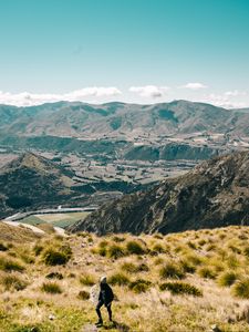 Preview wallpaper girl, mountains, grass, travel, tourist, queenstown, new zealand