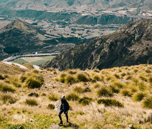 Preview wallpaper girl, mountains, grass, travel, tourist, queenstown, new zealand