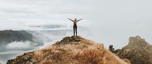 Preview wallpaper girl, mountains, top, freedom, grass