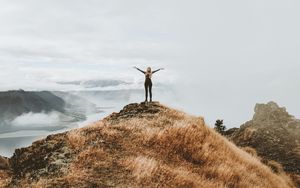 Preview wallpaper girl, mountains, top, freedom, grass