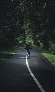 Preview wallpaper girl, movement, road, marking, trees