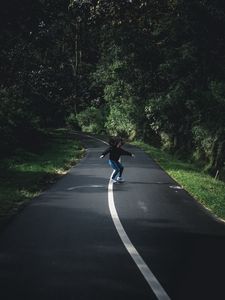 Preview wallpaper girl, movement, road, marking, trees