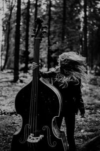 Preview wallpaper girl, musical instrument, bw, forest