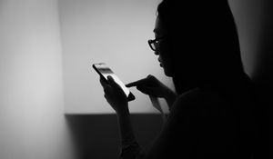 Preview wallpaper girl, phone, bw, dark, touch