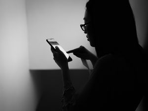 Preview wallpaper girl, phone, bw, dark, touch