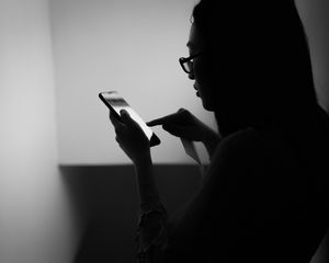 Preview wallpaper girl, phone, bw, dark, touch