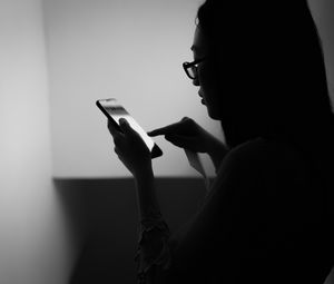 Preview wallpaper girl, phone, bw, dark, touch