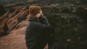 Preview wallpaper girl, rock, cliff, mountains, landscape