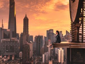 Preview wallpaper girl, roof, skyscrapers, metropolis, solitude, alone