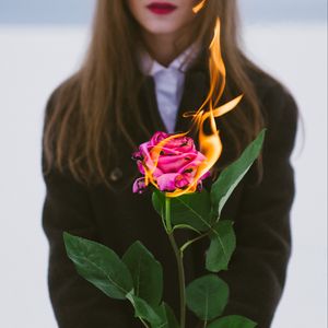 Preview wallpaper girl, rose, flower, fire, hands, flame