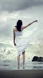 Preview wallpaper girl, sea, surf, dress, spray