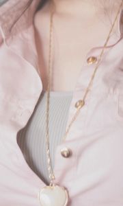 Preview wallpaper girl, shirt, pendant, tenderness