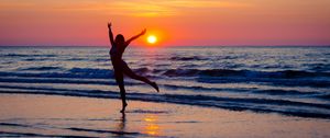 Preview wallpaper girl, silhouette, beach, sea, sunset, freedom, free, dark