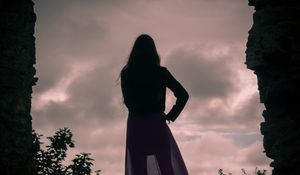 Preview wallpaper girl, silhouette, cave, twilight, dark
