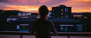Preview wallpaper girl, silhouette, dark, city, twilight