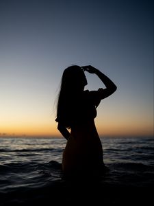 Preview wallpaper girl, silhouette, dark, water, sea