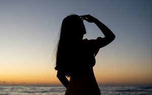 Preview wallpaper girl, silhouette, dark, water, sea
