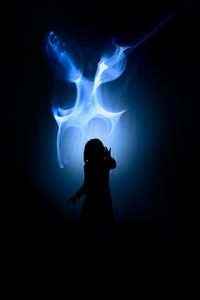 Preview wallpaper girl, silhouette, flame, dark