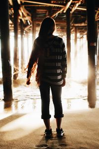 Preview wallpaper girl, silhouette, pier, water, sand