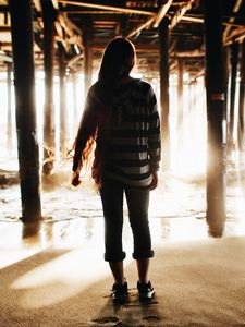 Preview wallpaper girl, silhouette, pier, water, sand