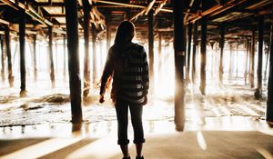 Preview wallpaper girl, silhouette, pier, water, sand