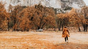 Preview wallpaper girl, silhouette, rock, trees, mountain