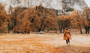 Preview wallpaper girl, silhouette, rock, trees, mountain