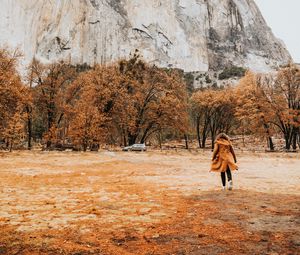 Preview wallpaper girl, silhouette, rock, trees, mountain