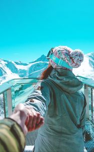 Preview wallpaper girl, snowboarder, mountains, sportswoman