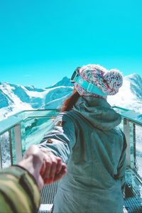 Preview wallpaper girl, snowboarder, mountains, sportswoman