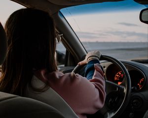 Preview wallpaper girl, steering wheel, car, salon