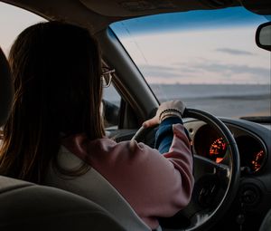 Preview wallpaper girl, steering wheel, car, salon