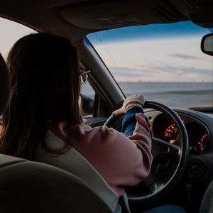 Preview wallpaper girl, steering wheel, car, salon