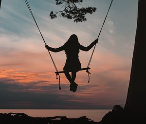 Preview wallpaper girl, swing, silhouette, branch, sunset