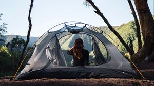 Preview wallpaper girl, tent, camping, trees, nature