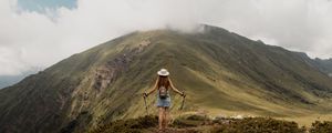 Preview wallpaper girl, tourist, traveler, mountains, clouds