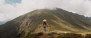 Preview wallpaper girl, tourist, traveler, mountains, clouds