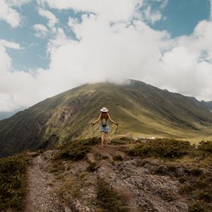 Preview wallpaper girl, tourist, traveler, mountains, clouds