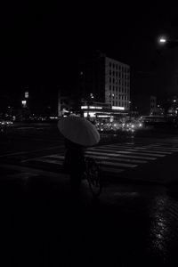 Preview wallpaper girl, umbrella, city, street, road, night, black and white