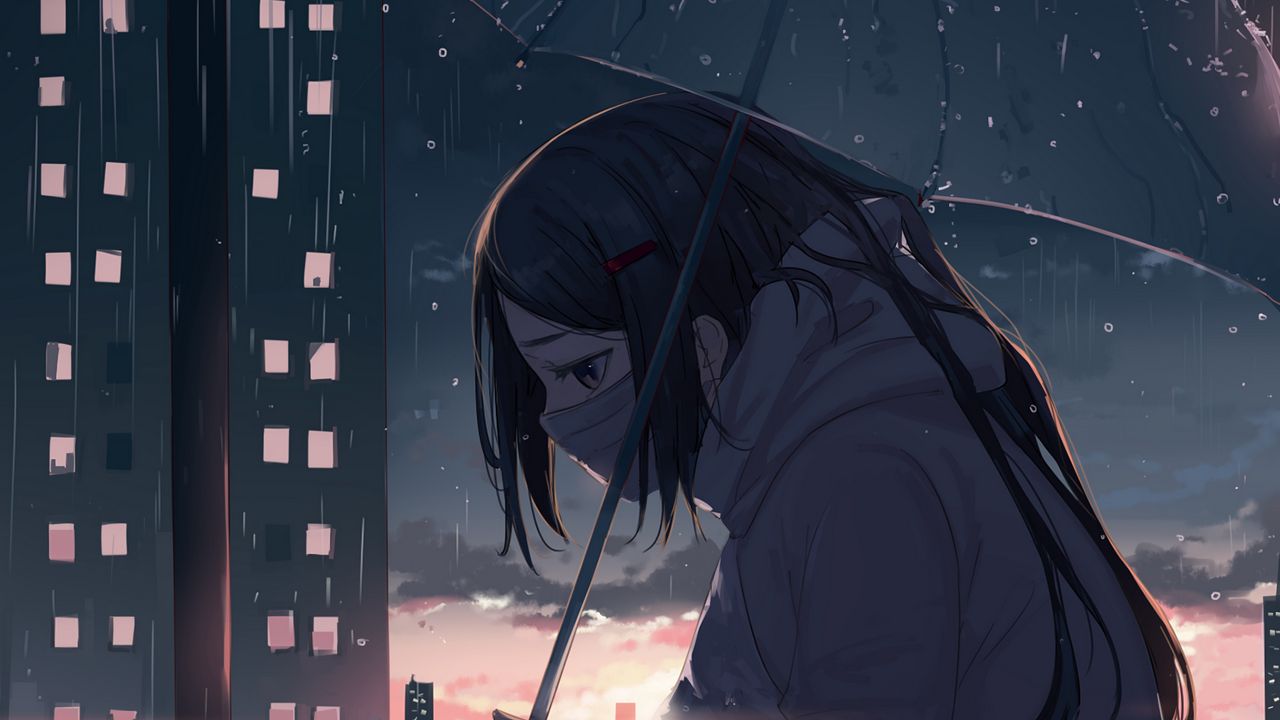 sad girl in the rain with umbrella