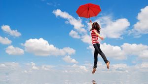 Preview wallpaper girl, water, flying, umbrella, mood