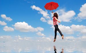 Preview wallpaper girl, water, flying, umbrella, mood