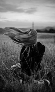 Preview wallpaper girl, wind, hair, bw