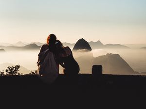 Preview wallpaper girls, girlfriends, friendship, fog, mountains